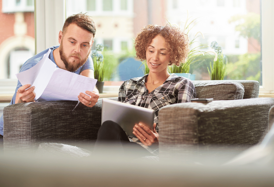 A couple double-checking the lender's eligibility criteria for a working capital loan.
